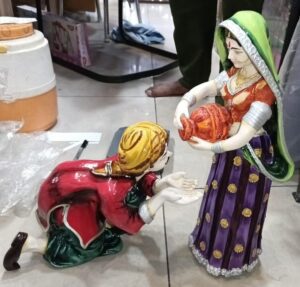Water Giving Lady & Drinking Man